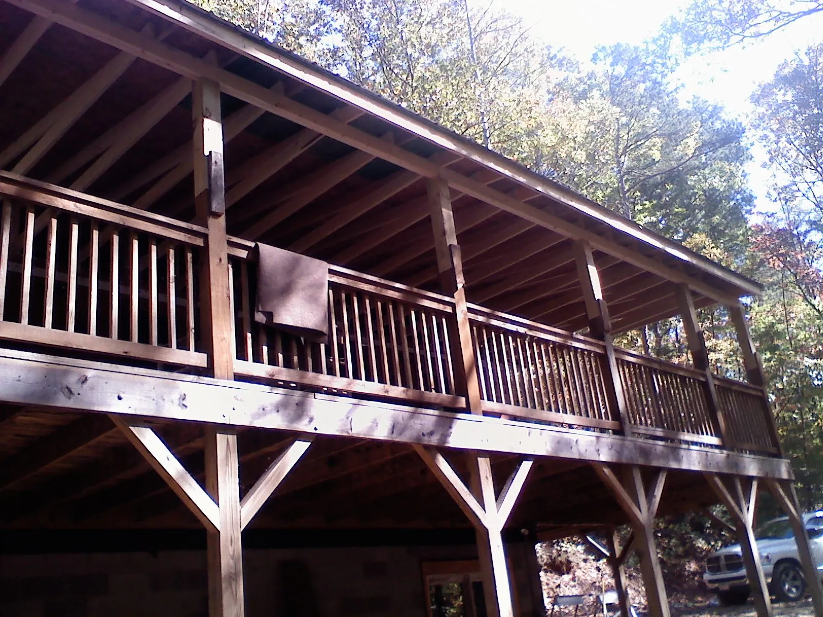 Timber framing under a new elevated porch and deck — Roof Leak Repair in Woodstock by Roofing Brothers